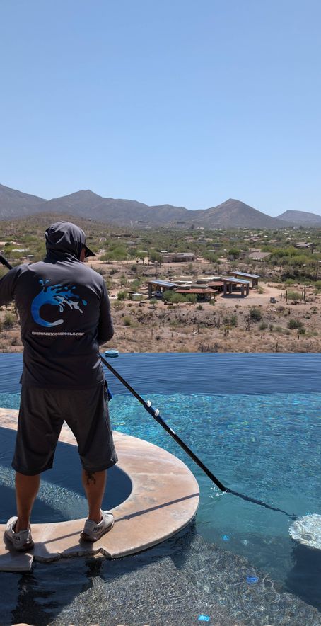 pool technician with amazing Arizona view