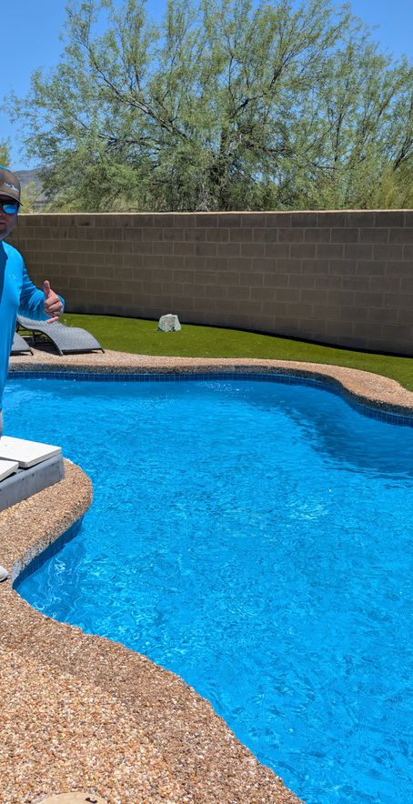 pool technician with pristine pool