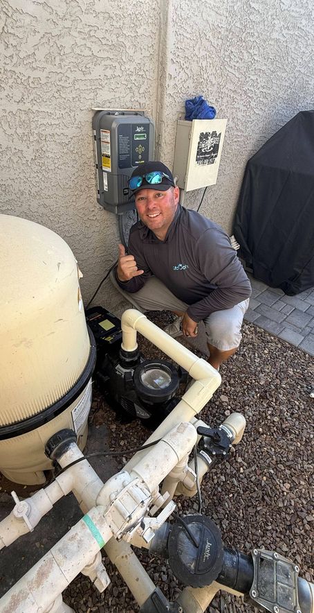 technician with newly installed pool pump